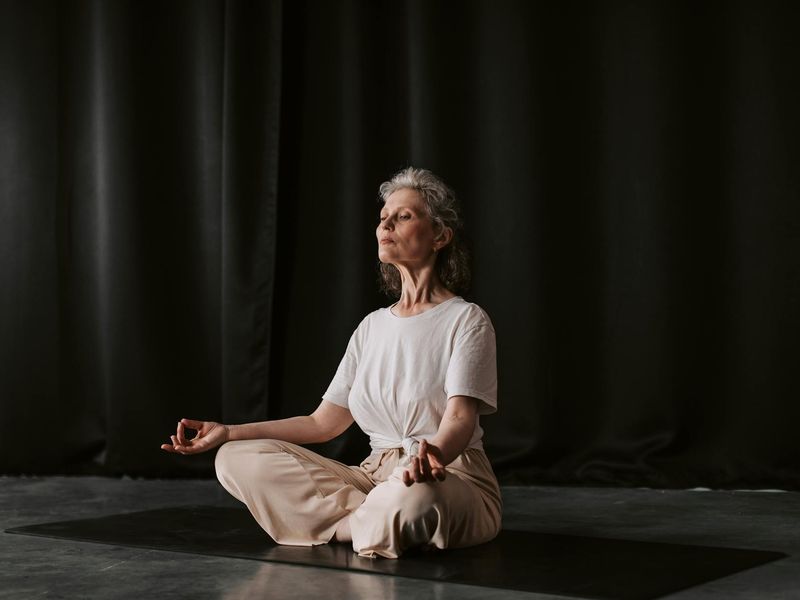 Detailed shot of hands in a yoga mudra position.